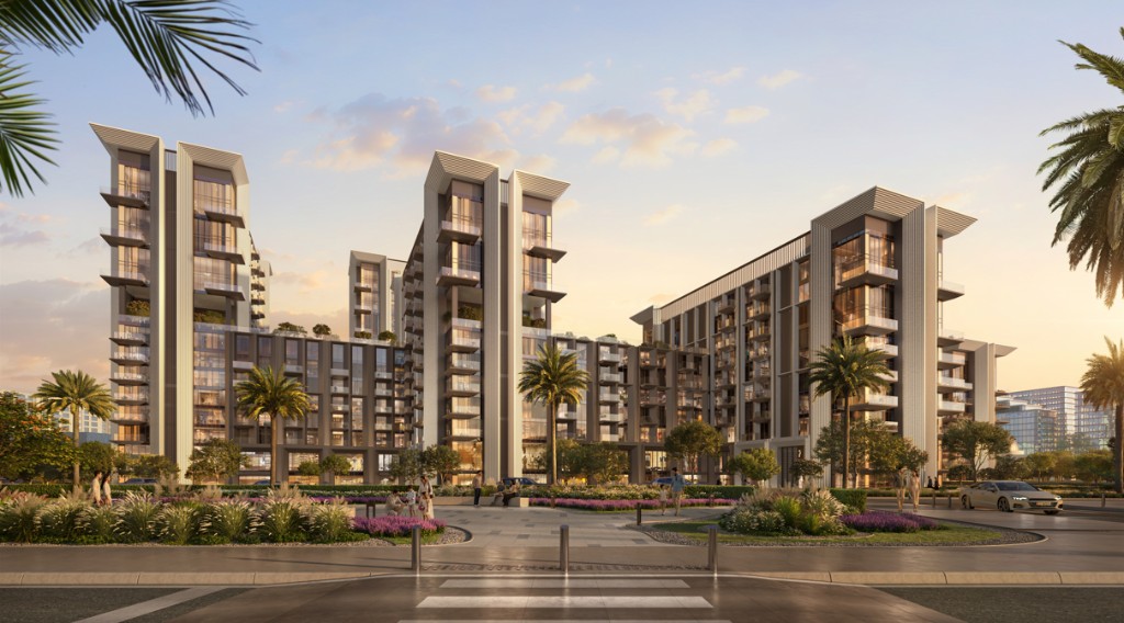 Golden hour street-level view of Sei Saadiyat by Aldar residential towers with palms and landscaped plaza on Saadiyat Island, Abu Dhabi